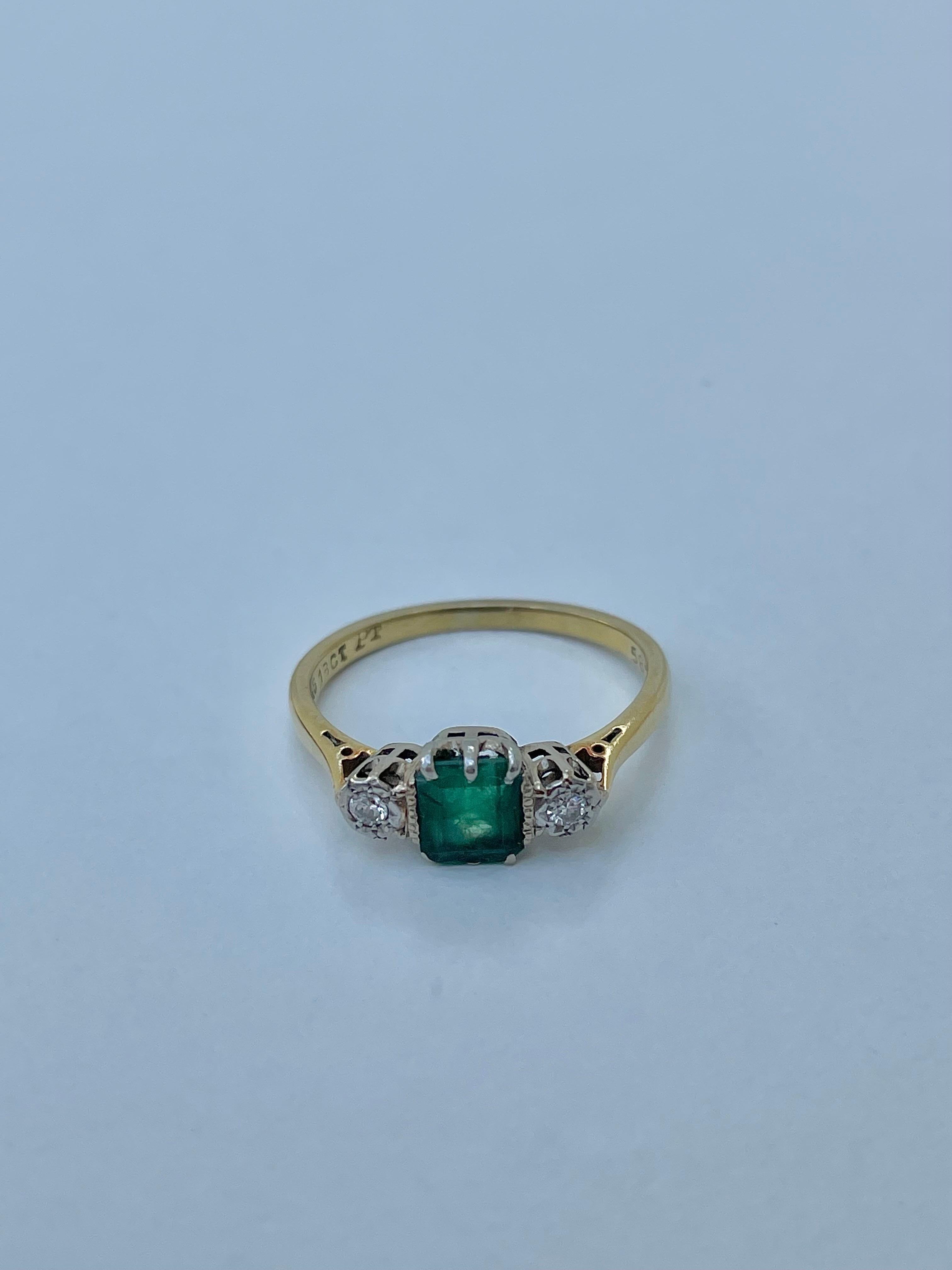 Art Deco Emerald and Diamond 3 Stone Ring in 18ct Yellow Gold 

sweet 3 stone ring, elegant and classy 

The item comes without the box in the photos but will be presented in a gift box

Measurements: weight 2.65g, size UK M, head of ring 17.8mm x