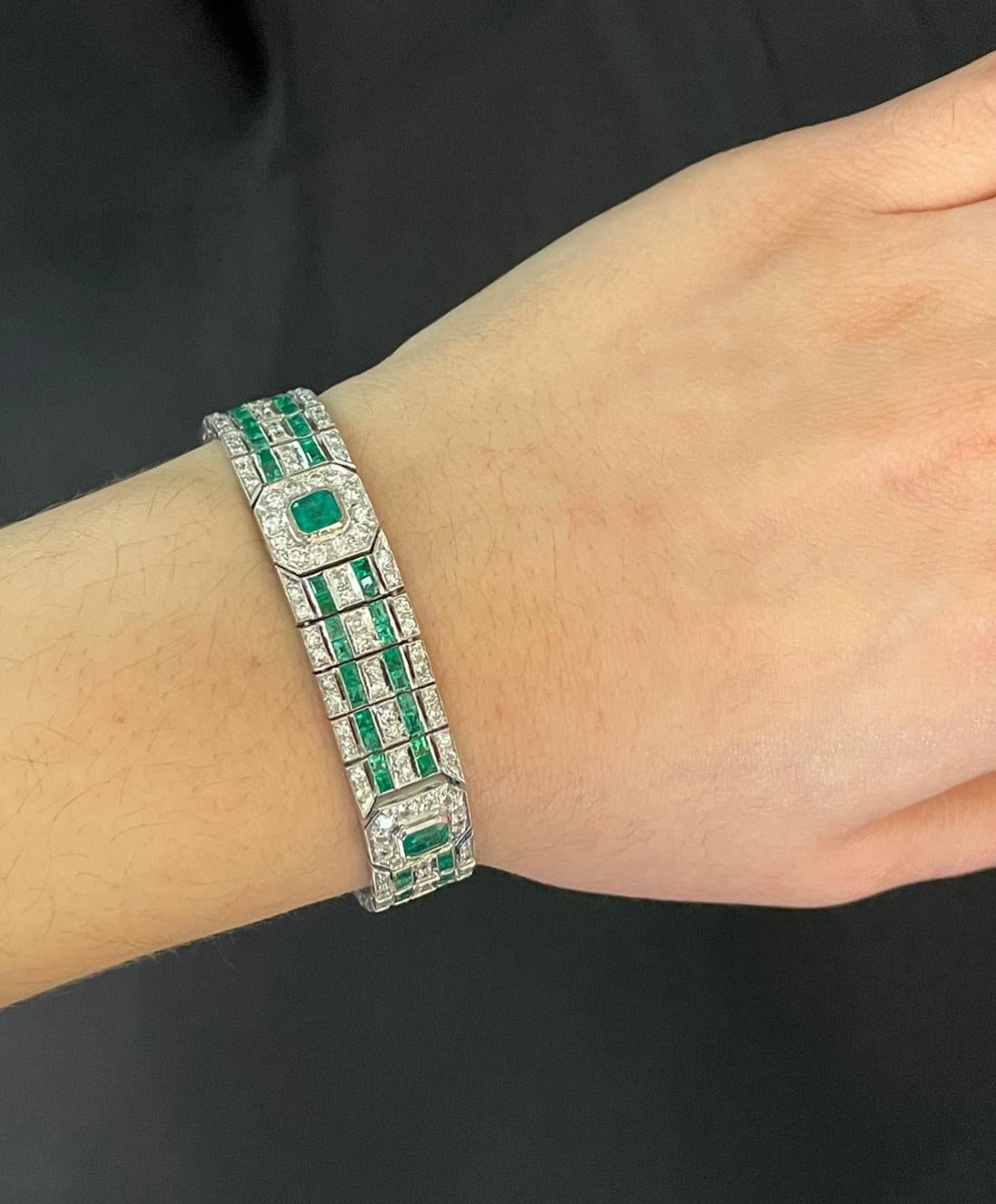 Art Deco Emerald and Diamond Bracelet

White gold art deco bracelet set with two rows of emeralds and round cut diamonds. 

Approximate Emerald Weight: 7.25
Approximate Diamond Weight: 4.15
Metal Type: 18 Karat White Gold