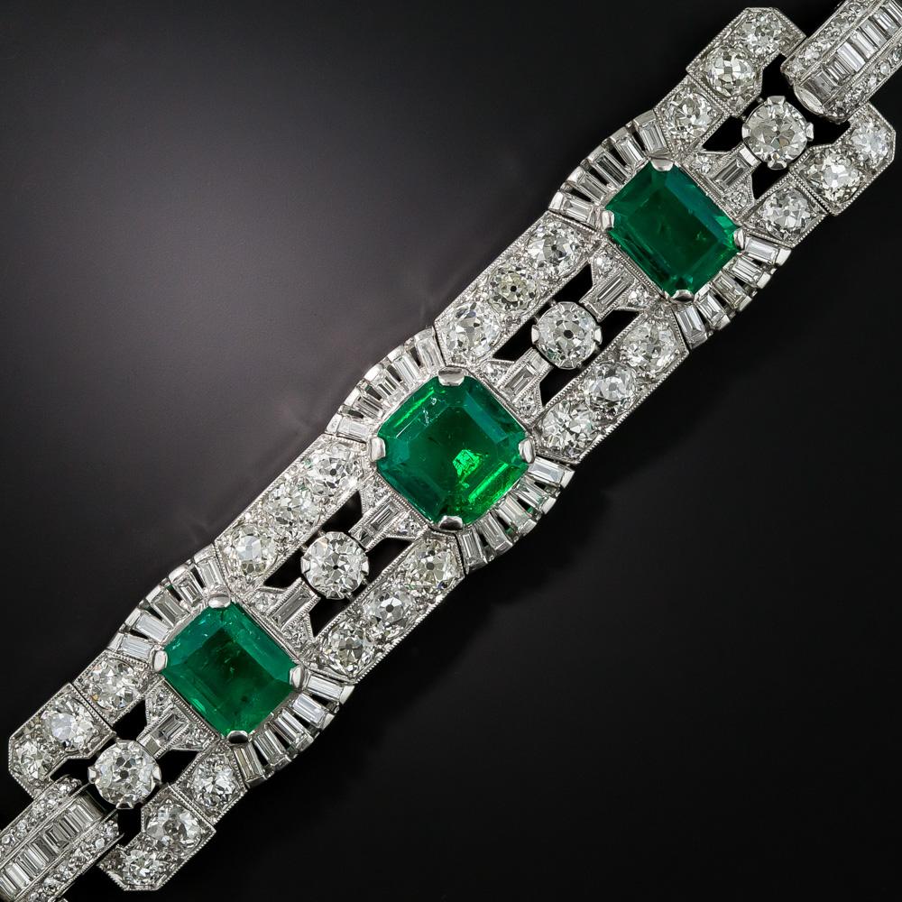 Extraordinary! Four gorgeous rich green Colombian emeralds, together weighing 14.36 carats - accompanied by a GIA Gemological Certificate stating: Colombia, No Indication of clarity enhancement,, embellished north and south with gleaming fans of