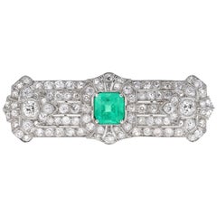 Broche Art Déco de esmeralda y diamantes