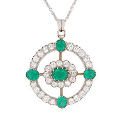 Art Deco Emerald and Diamond Cluster Pendant, circa 1920s Art Deco Emerald and Diamond Cluster Pendant, circa 1920s