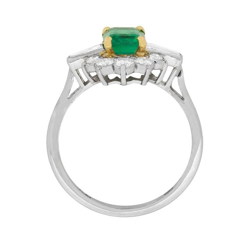 This simply beautifully gemstone rings highlights a fabulously rich green Emerald in the centre. The Emerald has been certified by an independent lab to be a natural stone, origin Columbia, and minor treatment, making it hugely desirable! It is