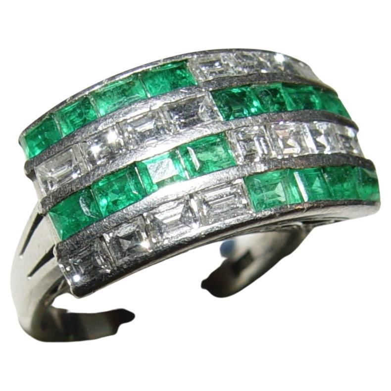 Beautiful Art Deco cocktail ring  (in very good condition for it's age). Cocktail ring set with  rectangular-step Cut natural Colombian Emeralds 1.09CT (emerald carat weight is stamped on the ring shank) emeralds exhibit exceptional green color. 