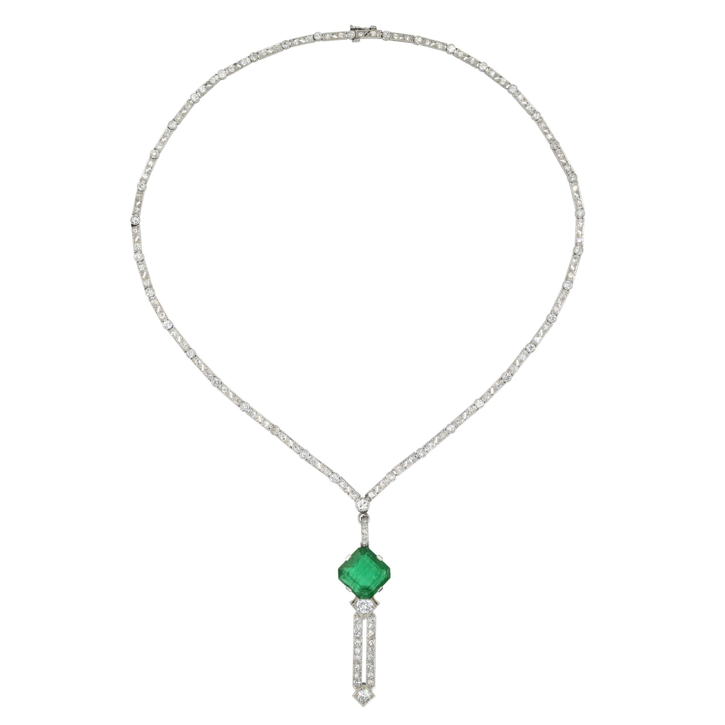 Platinum, Emerald and Diamond Necklace with detachable pendant, featuring cut cornered
square shaped emerald approx. 3.90 carats., 3 old European-cut diamonds approx.
0.65 carats, old European, transitional and single cut diamonds approx.
3.50