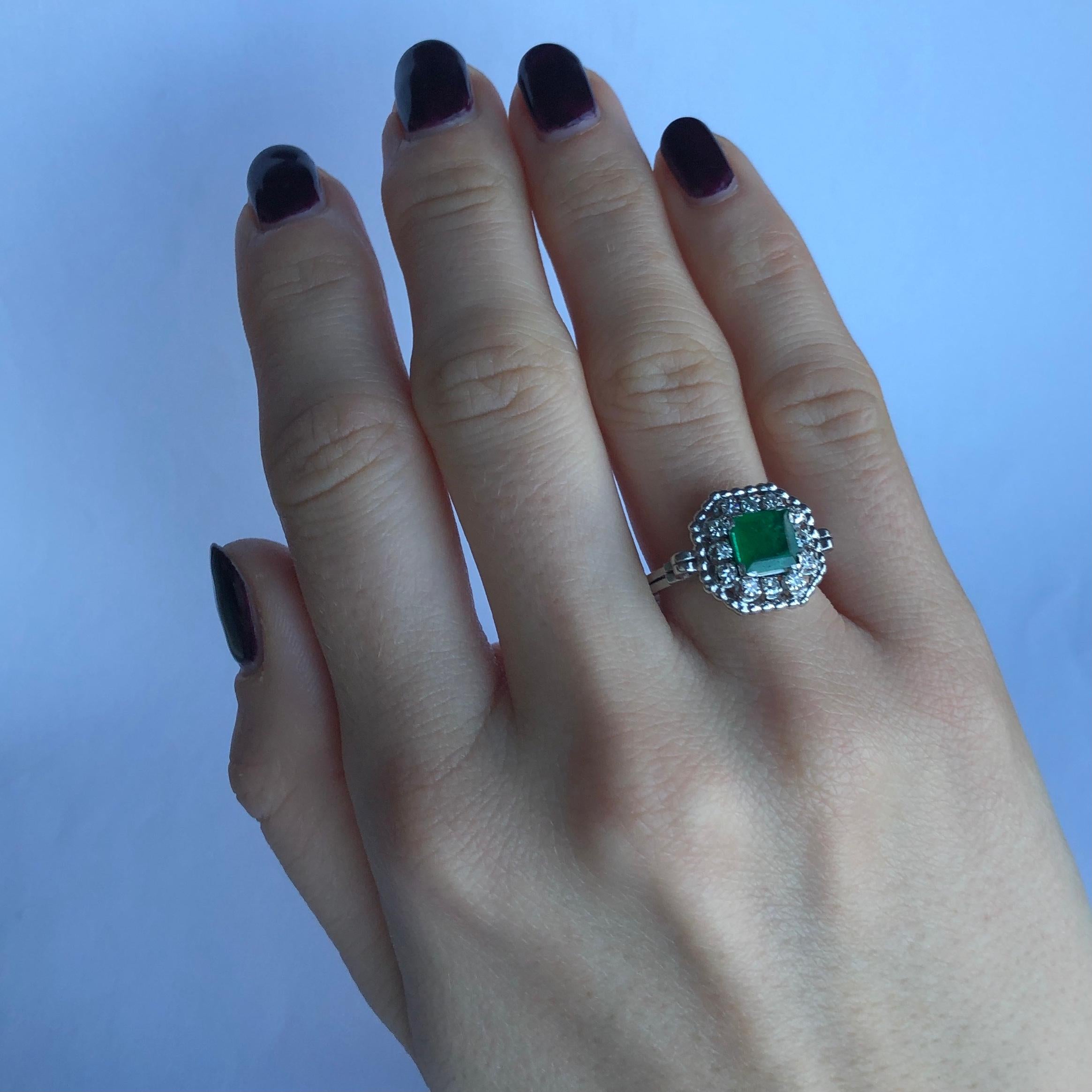 Women's Art Deco Emerald and Diamond Platinum Cluster Ring For Sale