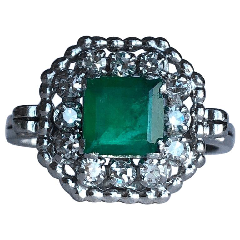 Art Deco Emerald and Diamond Platinum Cluster Ring For Sale