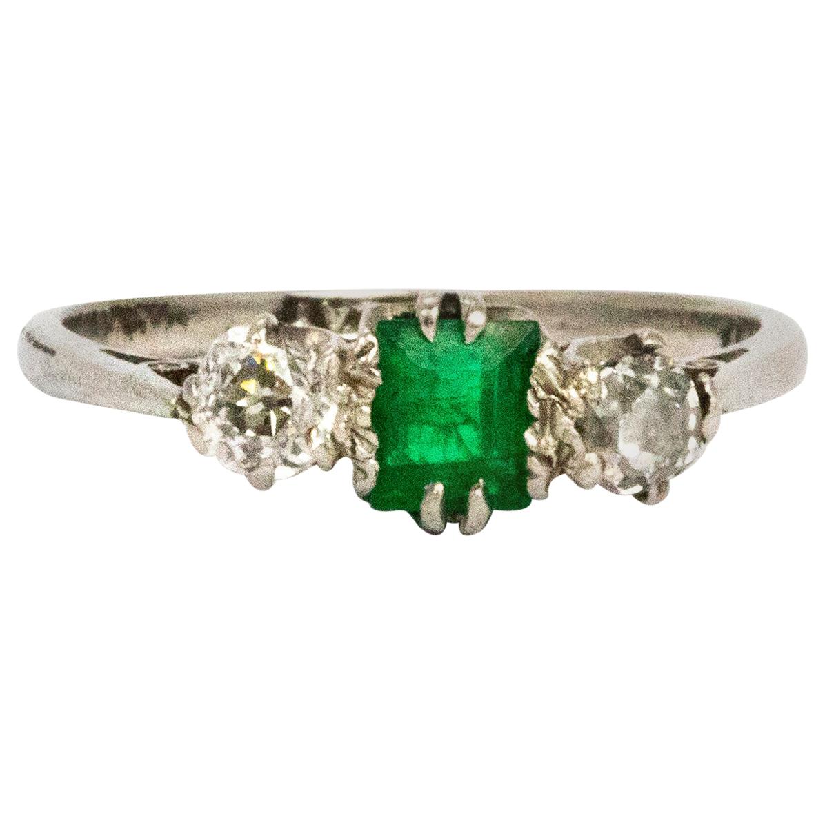 Art Deco Emerald and Diamond Platinum Three-Stone Ring