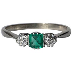 Art Deco Emerald and Diamond Platinum Three-Stone Ring