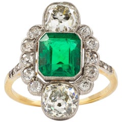 Anello Art Deco con smeraldo e diamante