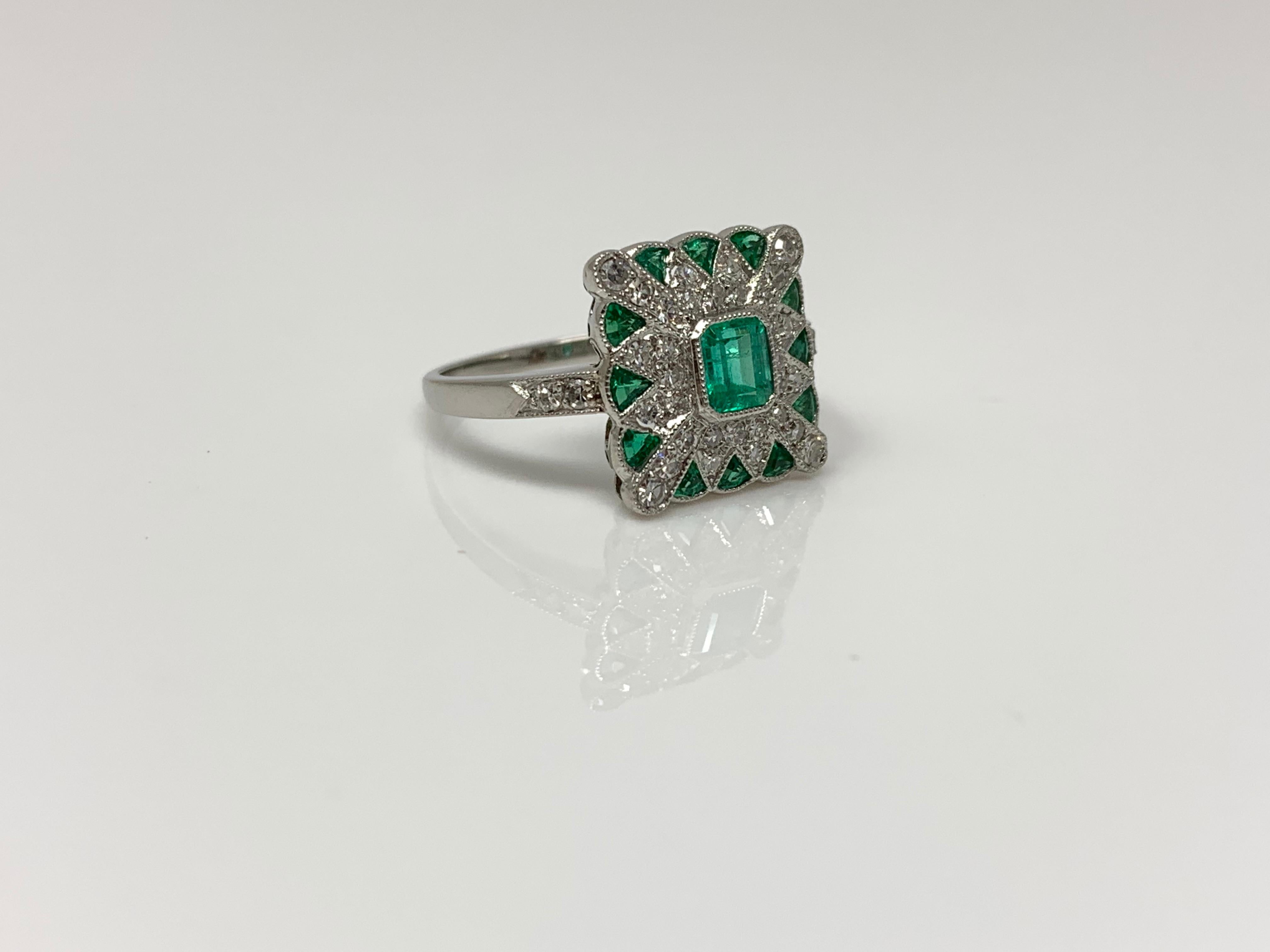 Women's Emerald and Diamond Ring in Platinum