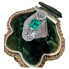 Antique Art Deco Emerald and Diamond Three Stone Ring