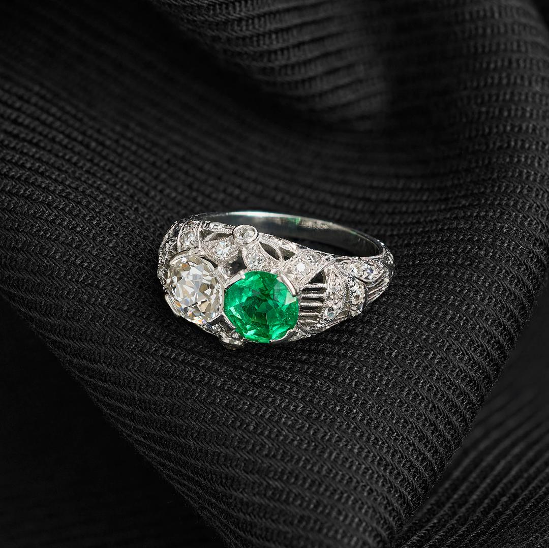 Women's or Men's Art Deco Emerald and Diamond Two-Stone Filigree Ring For Sale