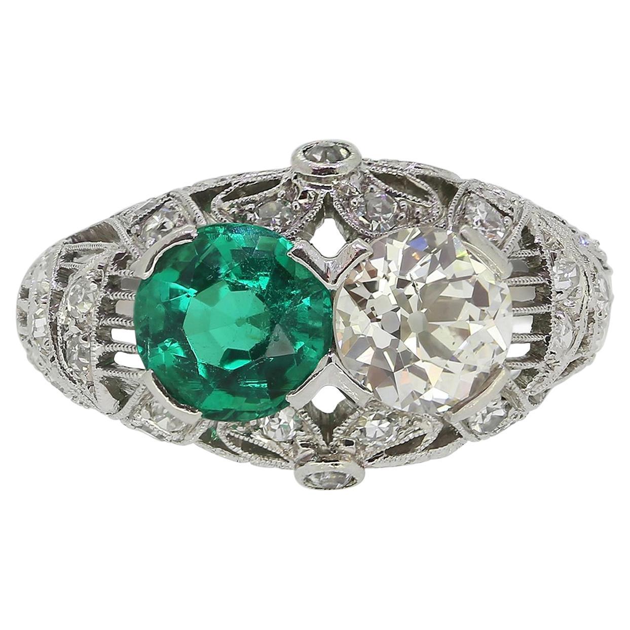Art Deco Emerald and Diamond Two-Stone Filigree Ring