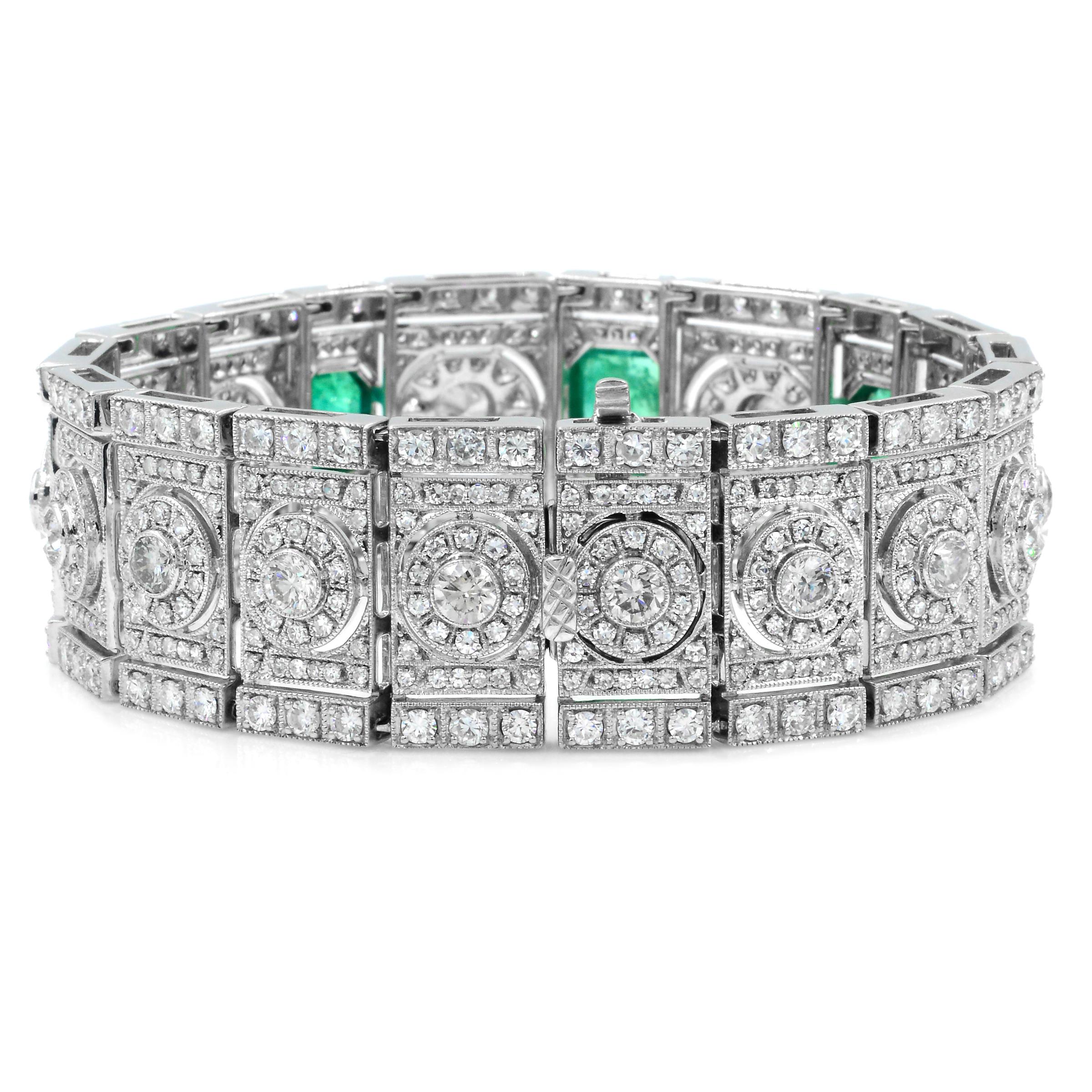 Art Deco Emerald And Diamond Wide Bracelet in 18K White Gold

Material: 18K White Gold 
Emerald Weight: 3 EC 6.95cts 
Emeralds Origin: Zambian
Diamonds: 14.69cts
Bracelet Length: 7 inches 
Bracelet width: 15mm