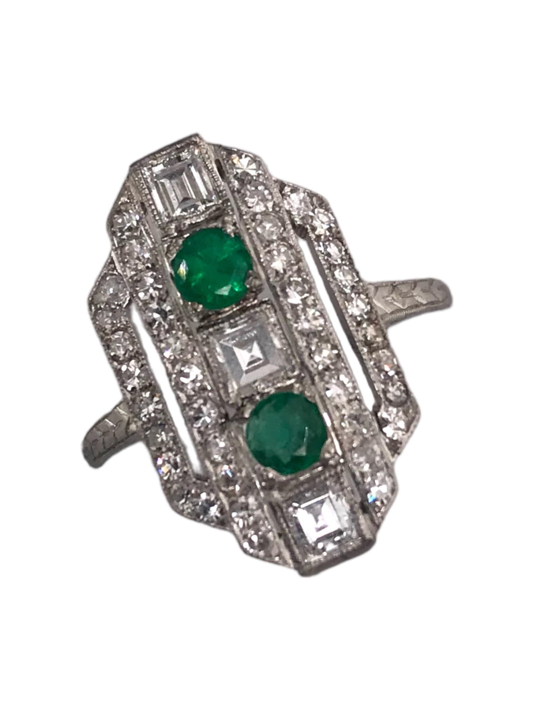 What a stunning combination! 
We absolutely love every bit of this unique Art Deco, 1920 - 1940, Cocktail Ring.

Accenting the ring are:
 3 - Carre Cut Diamonds; 0.2 Carat Each, FG Color, VS1 Clarity
2 - Round Natural Emerald Gemstones; 3.25mm