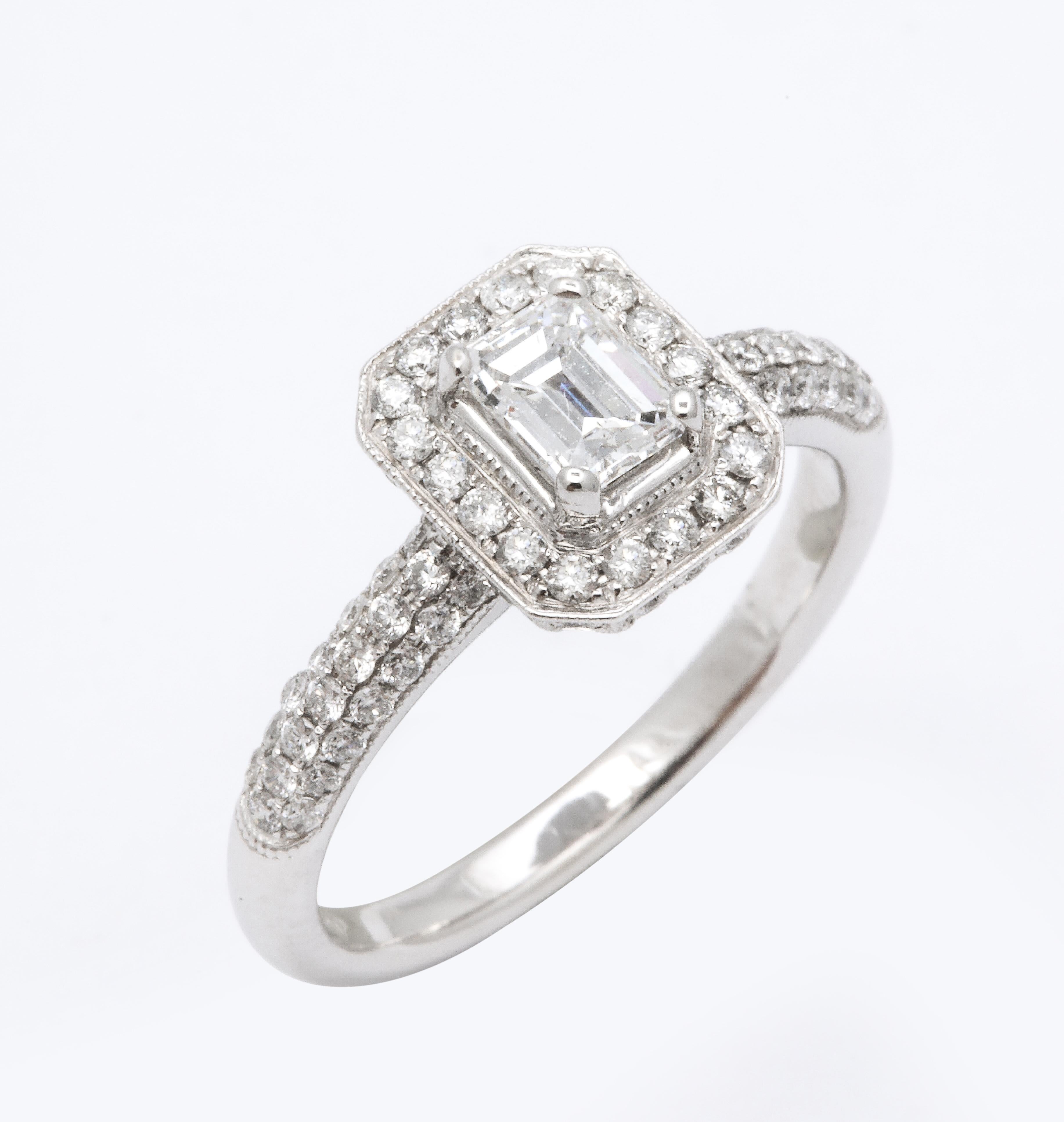 Emerald Cut Diamond and 18k White Gold Engagement Ring In Good Condition For Sale In New York, NY