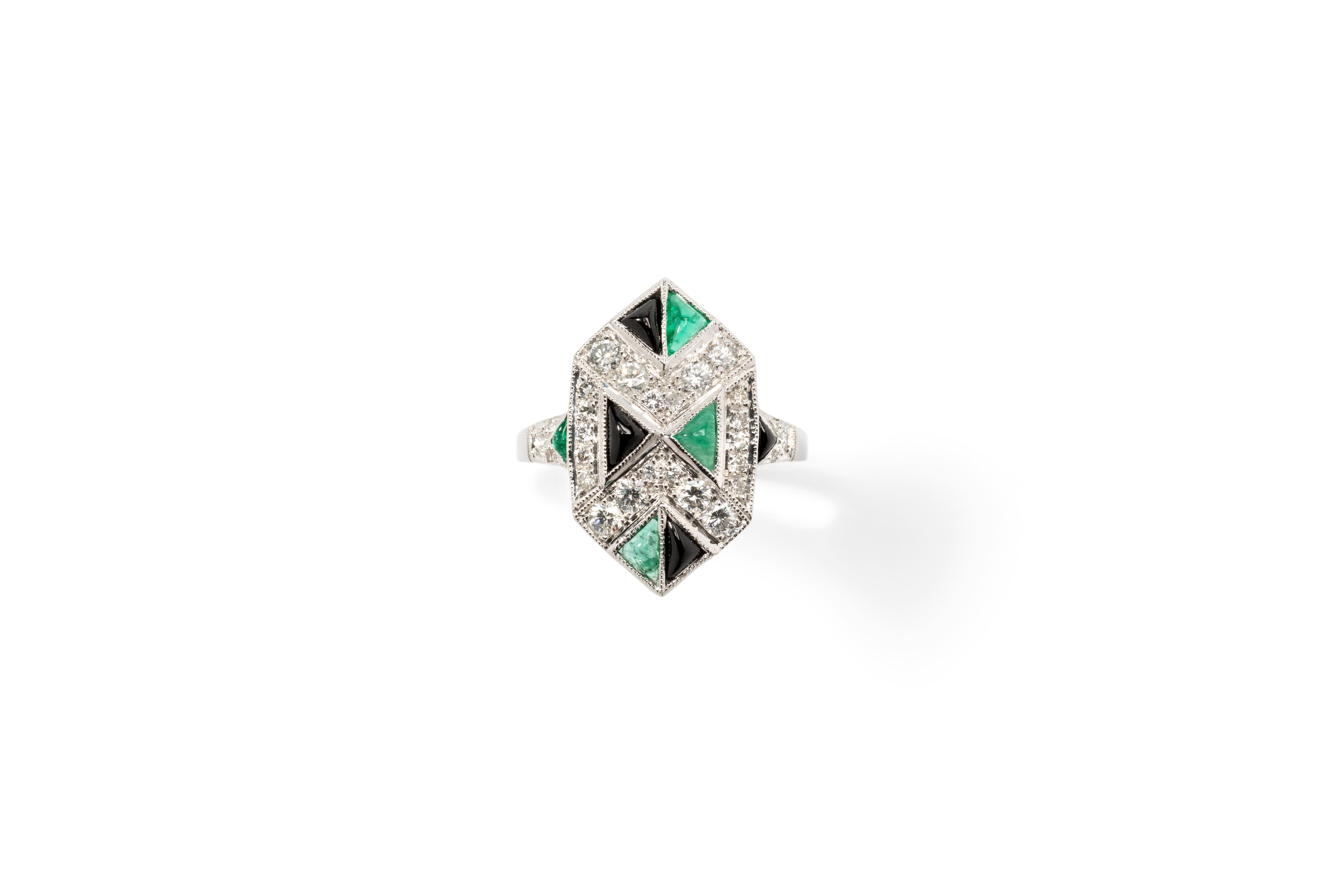 France, 2000s. Hexagonal front in geometric design. Set with 28 brilliant-cut diamonds weighing total 0.75 carat, 
color VS. Accompanied by 4 triangular emeralds and 4 triangular onyx. Mounted in 18 carat white gold. 
Marked with the purity 18K.