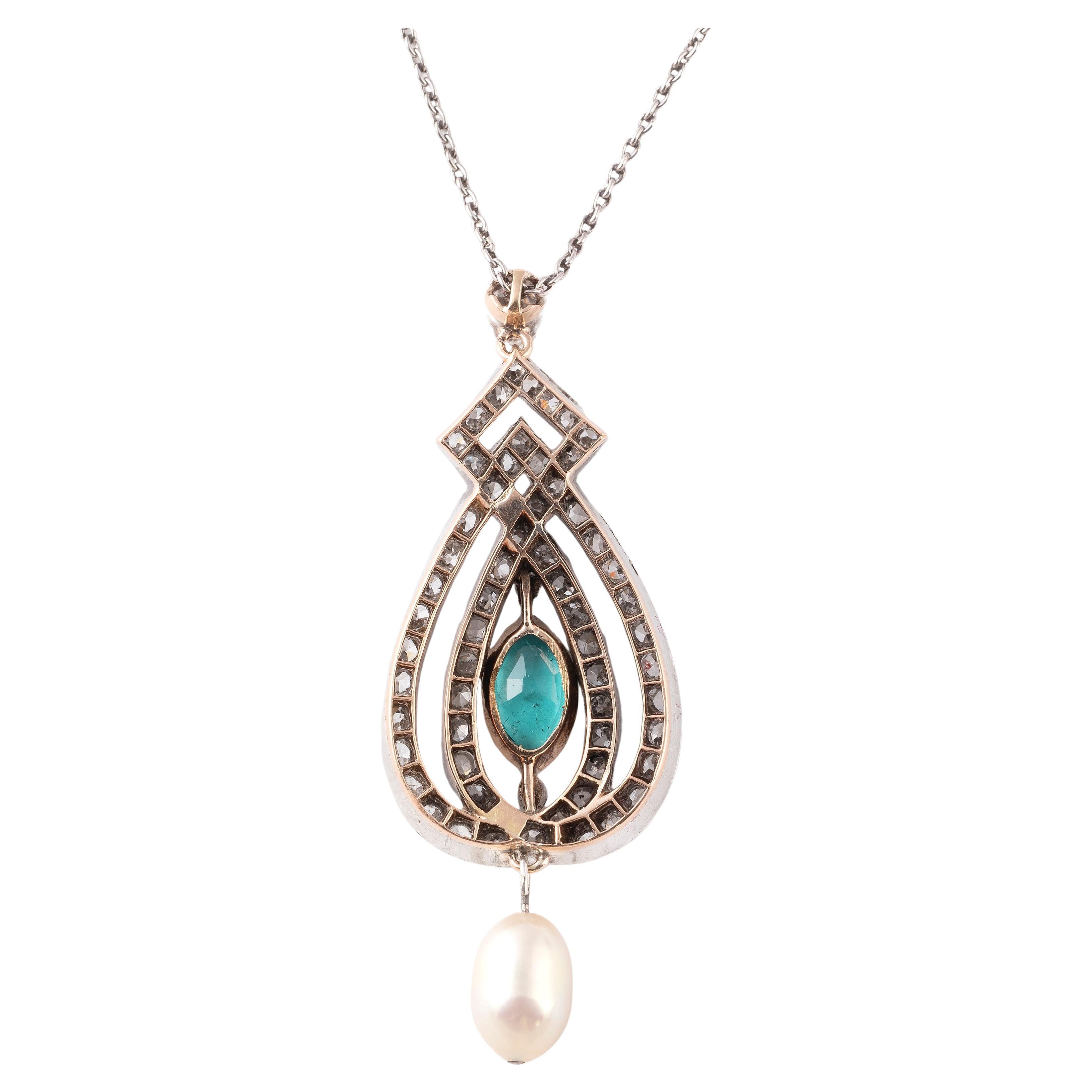 The openwork cartouche, millegrain set to the centre with a marquise-cut emerald, within an old brilliant and rose-cut diamond surround, suspending a natural pearl drop, to a fine platinum chain necklace.
Length 4cm 
Width 3.8cm 
Weight: 10g

