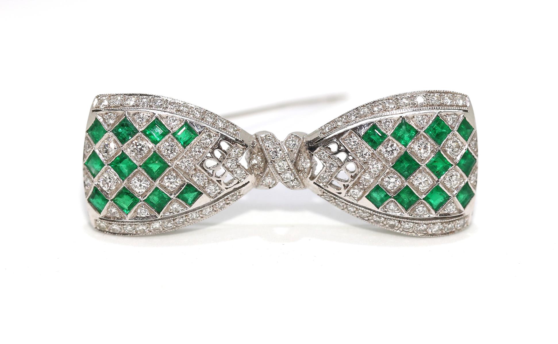 Art Deco perfect design example with square Emeralds and Diamonds forming a fine Platinum Bow brooch. It will sit perfectly on any outfit for any occasion.  1.75 Ct of Emeralds and 1.30 Carats of Diamonds.
Once it was common to communicate a message