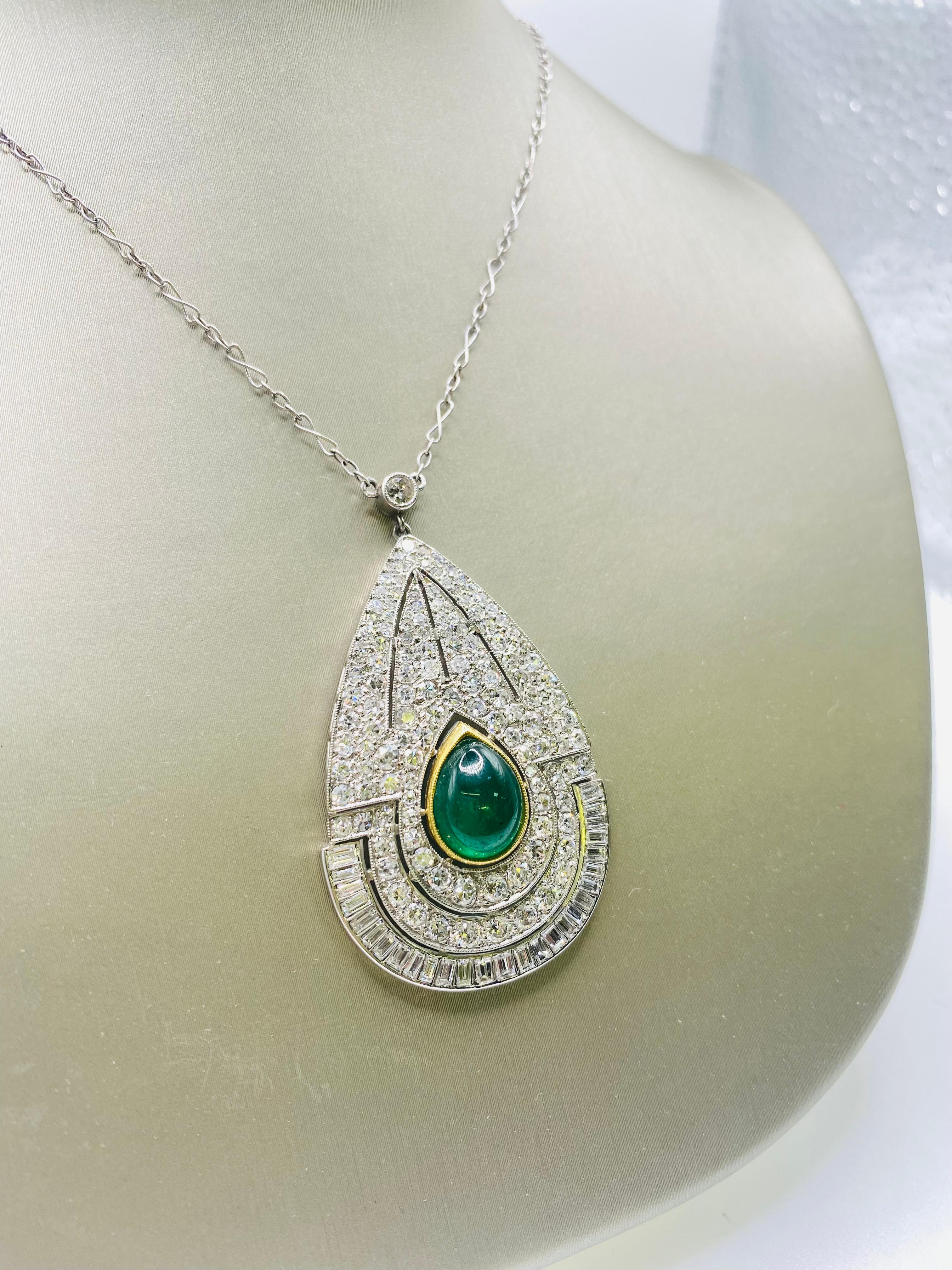 Platinum 4.50ct diamond & 2.27ct emerald pendant - circa 1930' estate piece.
