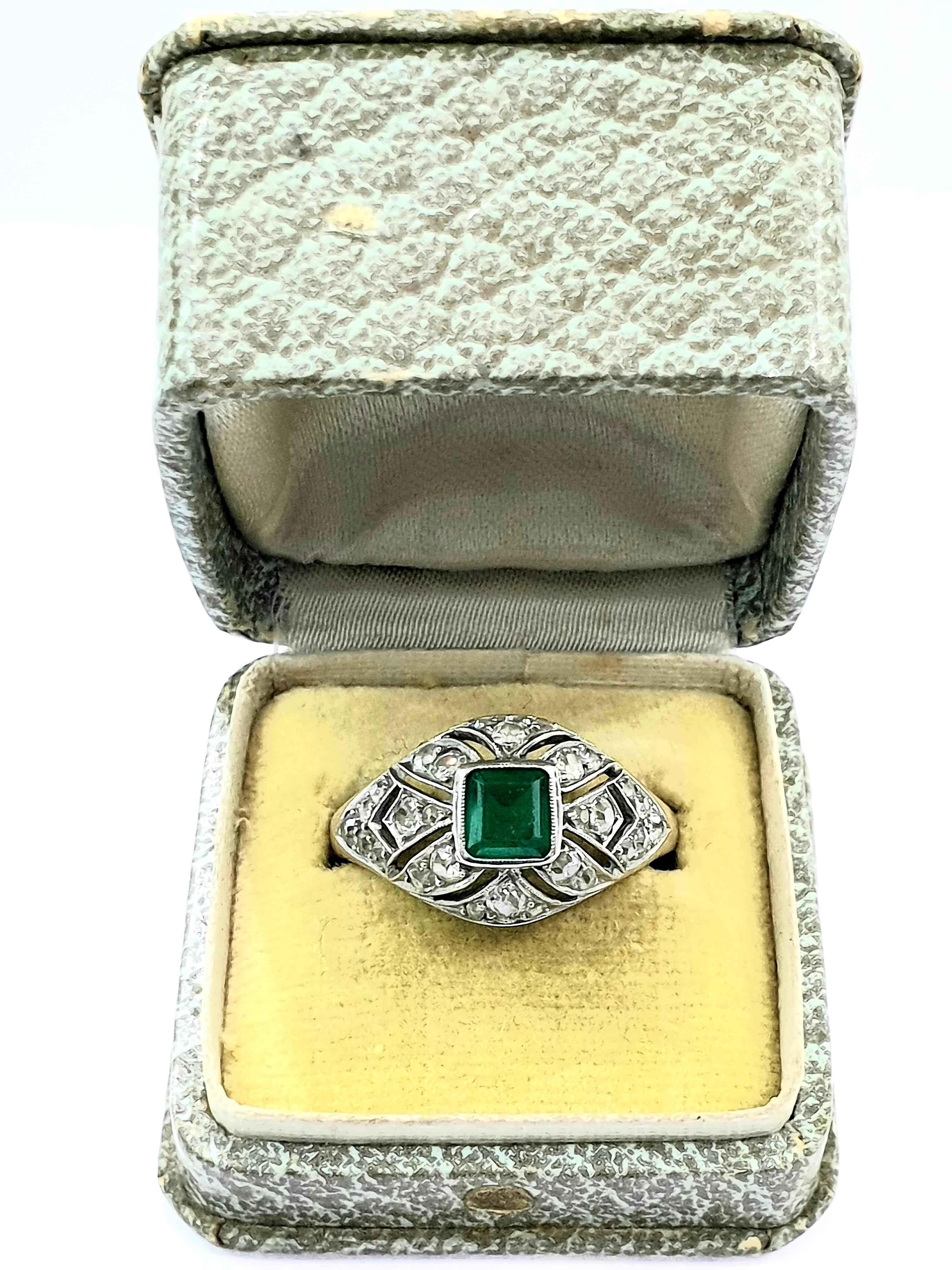 Art Deco Bombe Emerald DIamond ring . The ring is French origin  hallmarked with dog head for platinum. It is from the 1920's time era  and has the original box. Size  8 3/4  US