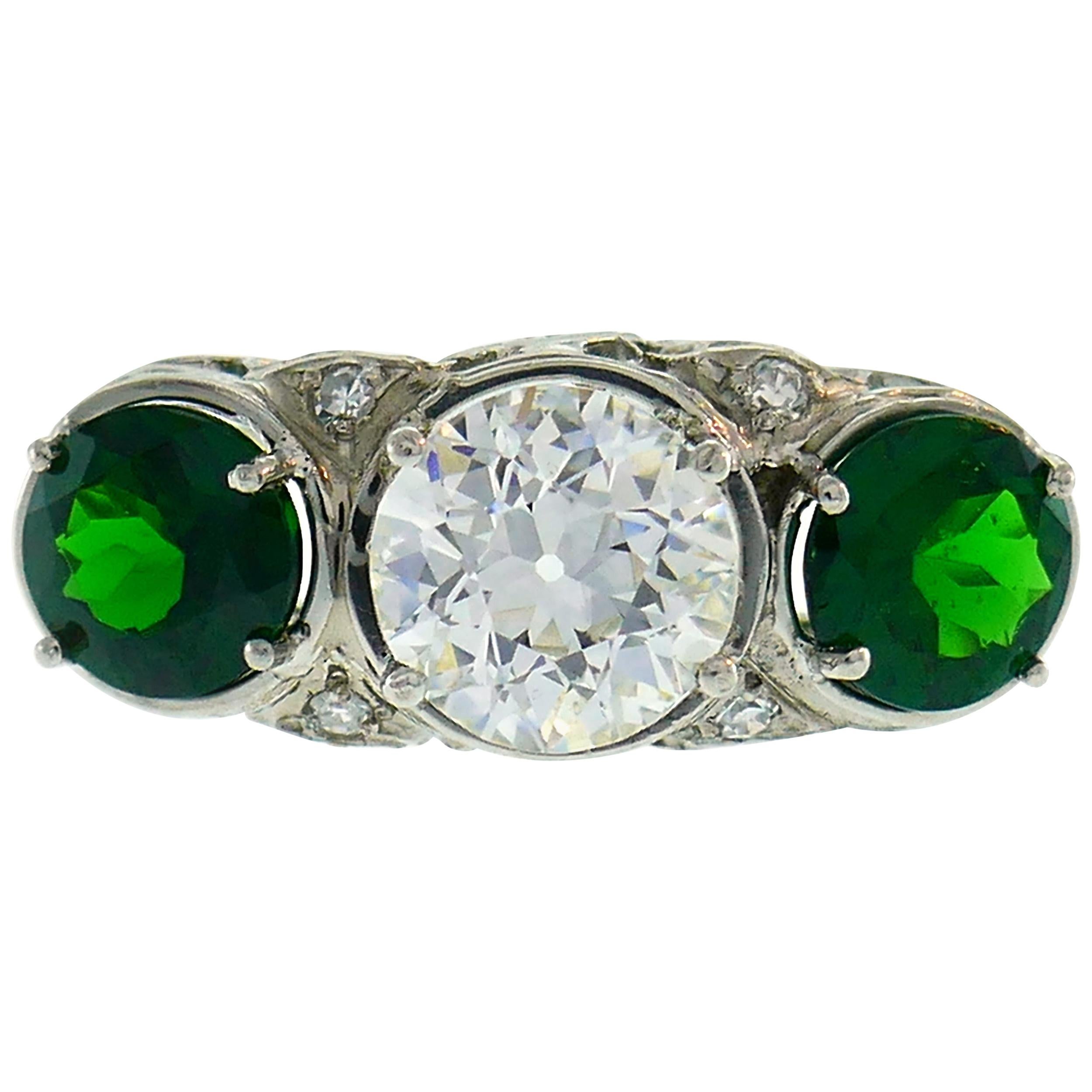 Art Deco Emerald Diamond Platinum Three-Stone Ring For Sale