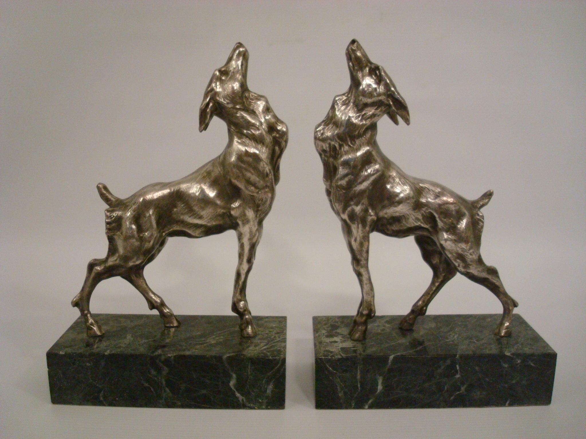 Art Deco Bookends. Emile Joseph Nestor Carlier, (French, 1849-1927). Figural Goat Bookends. Silvered Metal mounted over Green Marble bases. Nice and heavy.