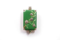 Art Deco enamel pendant watch in 18 karat yellow gold and platinum