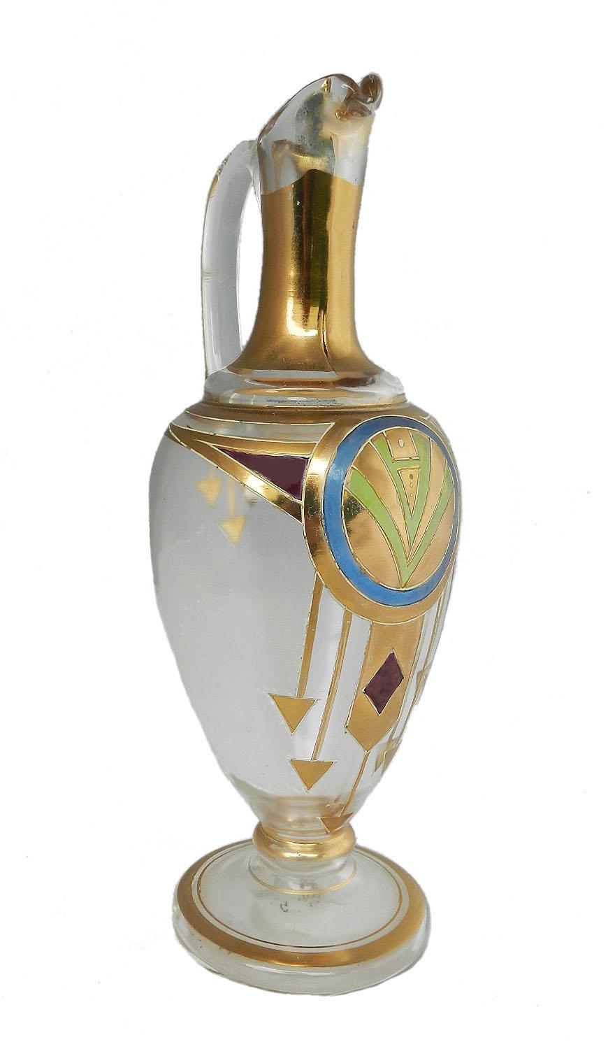 Art Deco Enameled Glass Ewer French, circa 1930.
One only....
High quality enamel with gold
Hand blown with makers numbers underneath
In very good condition for its age with only minor marks of use for its age 


