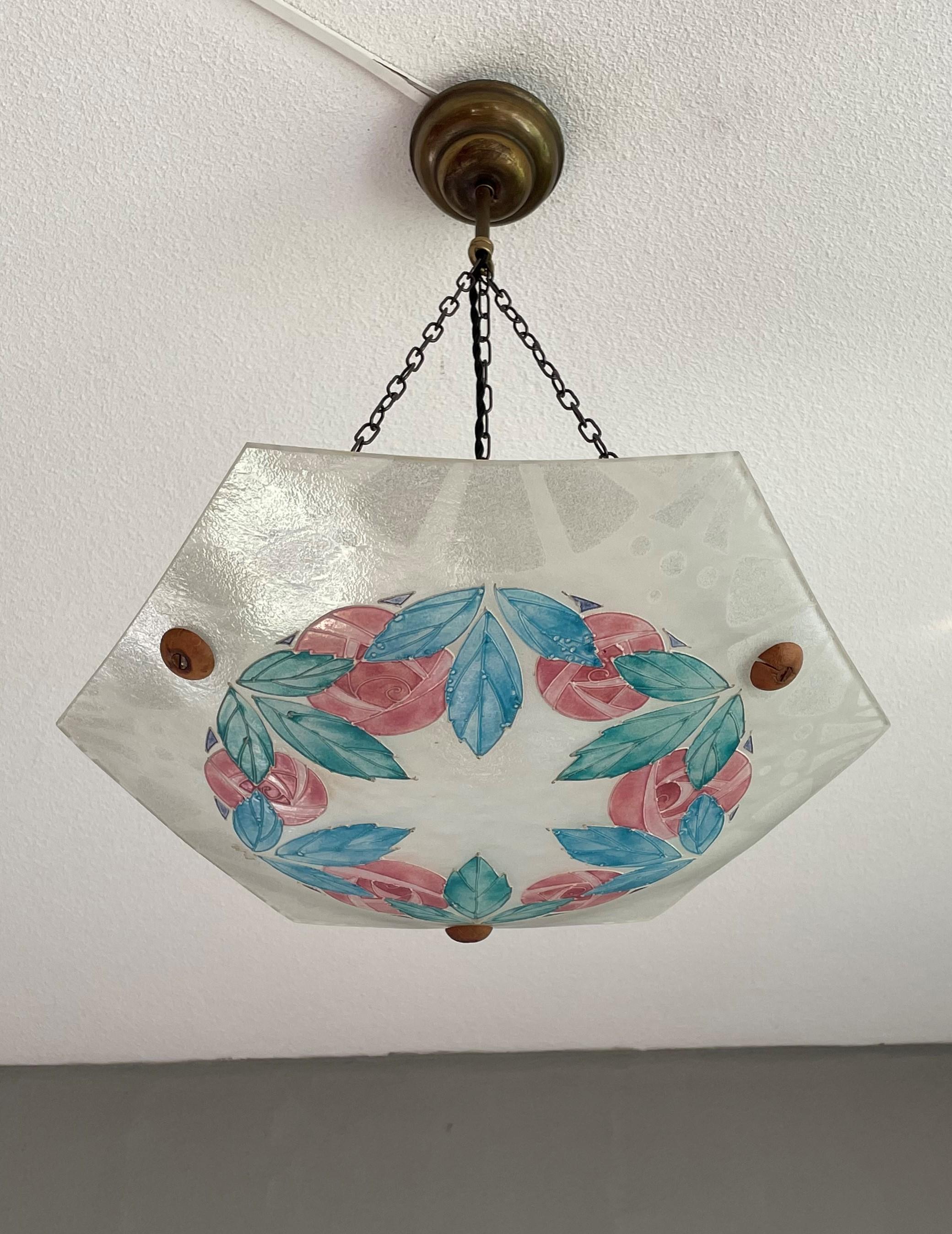 Stunning and stylish work of lighting art, signed B.M.

If you are passionate about early 20th century decorative art in general and roses (and what they stand for) in particular then this graceful pendant light could be flying your way soon. What