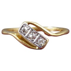 Art Deco Engagement Ring Set with Three Diamonds in Rectangular Cross over Twist