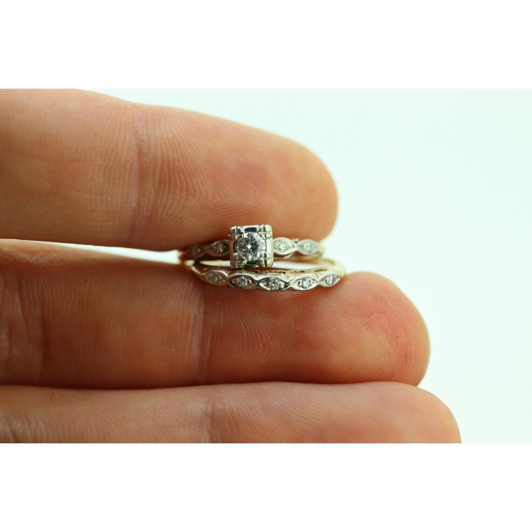 Vintage from the 1940s
Size: 5 1/4 US
Materials: Stone
Gemstone: Diamond
Gem color: Colorless
Band color: Gold
Adjustable

Style: Art deco

About this item

Antique Engagement Set.

Appraised at 1800$ Replacement value. Full Appraisal is included