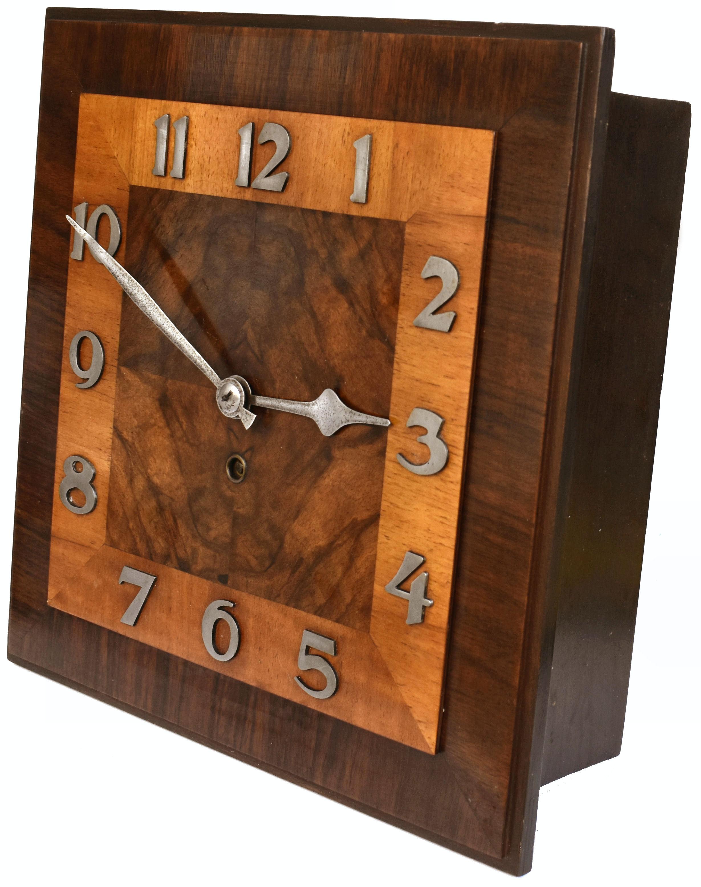 For your consideration is this large sized Art Deco Walnut wall clock, English, circa 1930, fully serviced and keeping good time. The dial is made up of book paged figured walnut central square with a two tone feather banding edging in a mid tone