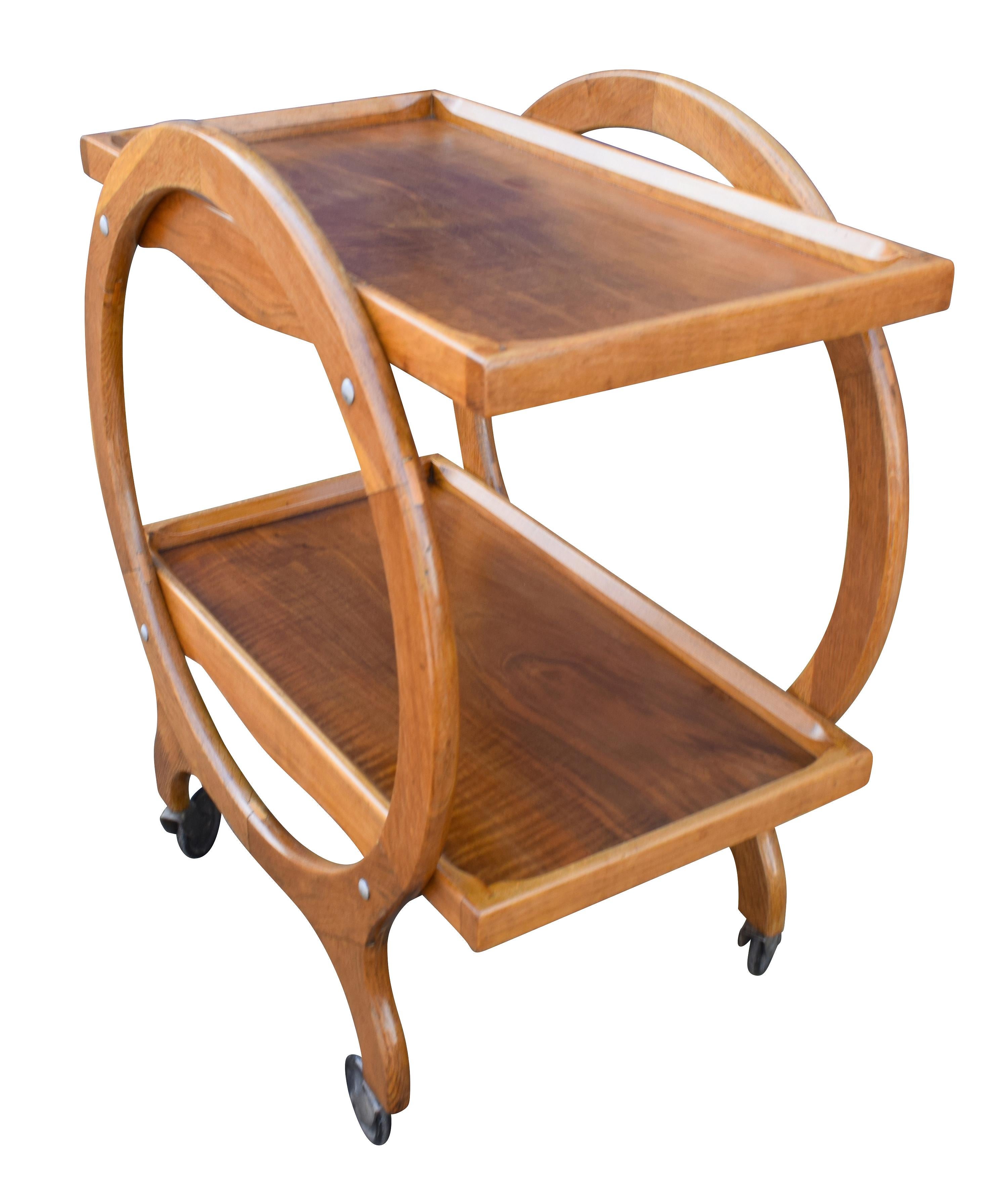 Very attractive and iconic English Art Deco Hostess trolley cart dating from the 1920s-1930s period. This three-tiered trolley not only looks awesome but is very functional too. Mid tone walnut with some figuring to the veneers. The condition is