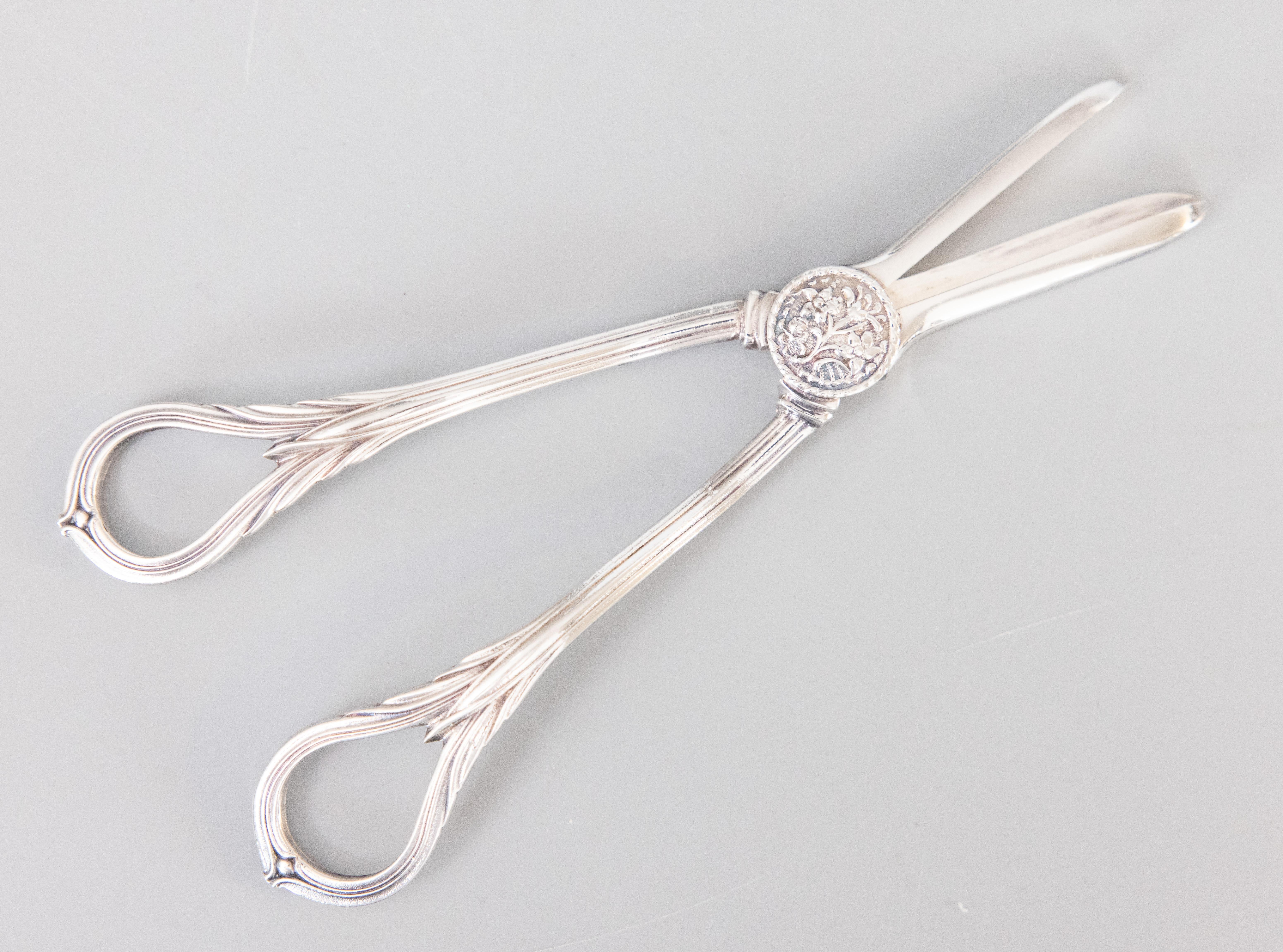 A lovely pair of antique English Art Deco style silver plate grape shears or flower cutting rose scissors, circa 1920. Marked 