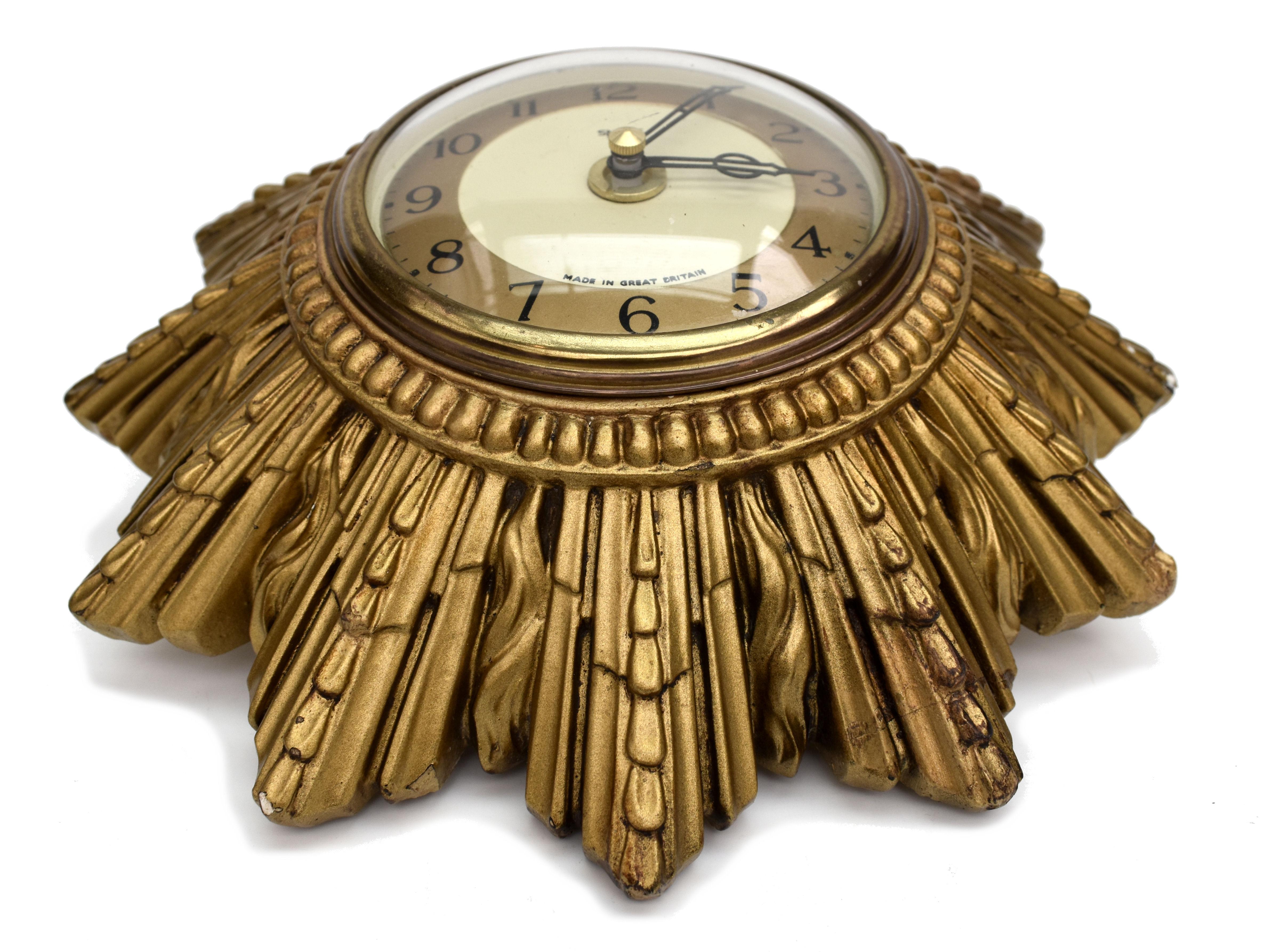 For your consideration is this original 1930s Art Deco wall clock by English clock makers Smiths. Originally had an electrical movement which we've converted to battery - uses double AA batteries. The casing is made from Gesso and is in superb