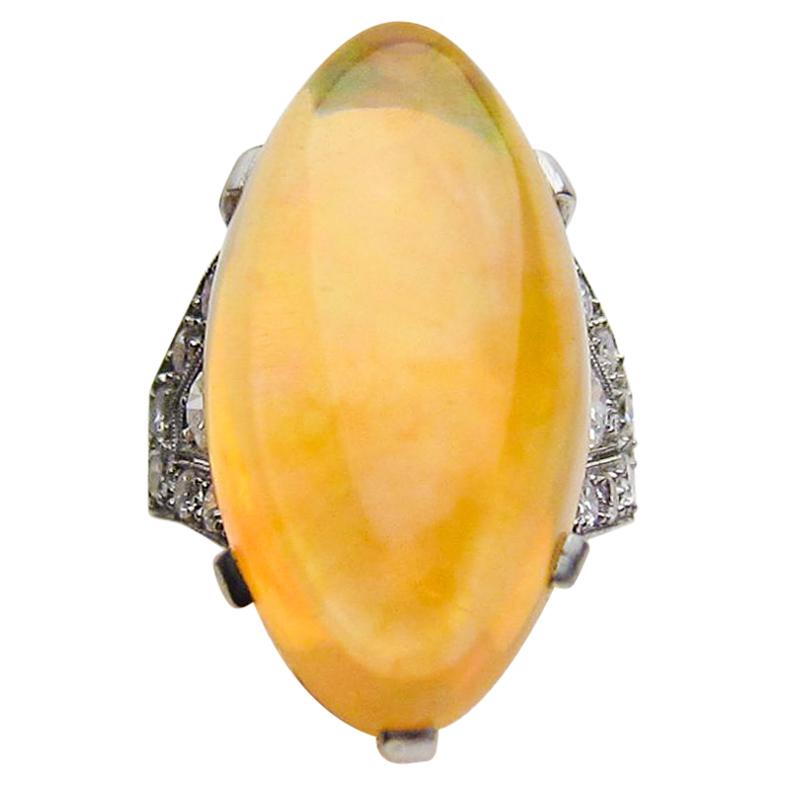 Art Deco Era 14.75 Ct Orange Ethiopian Opal Cabochon and Diamond Platinum Ring
