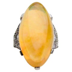 Art Deco Era 14.75 Ct Orange Ethiopian Opal Cabochon and Diamond Platinum Ring