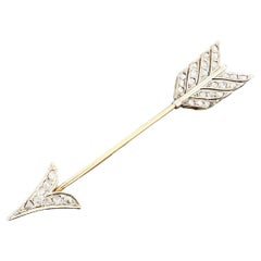 Art Deco era 18K gold diamond arrow jabot pin brooch