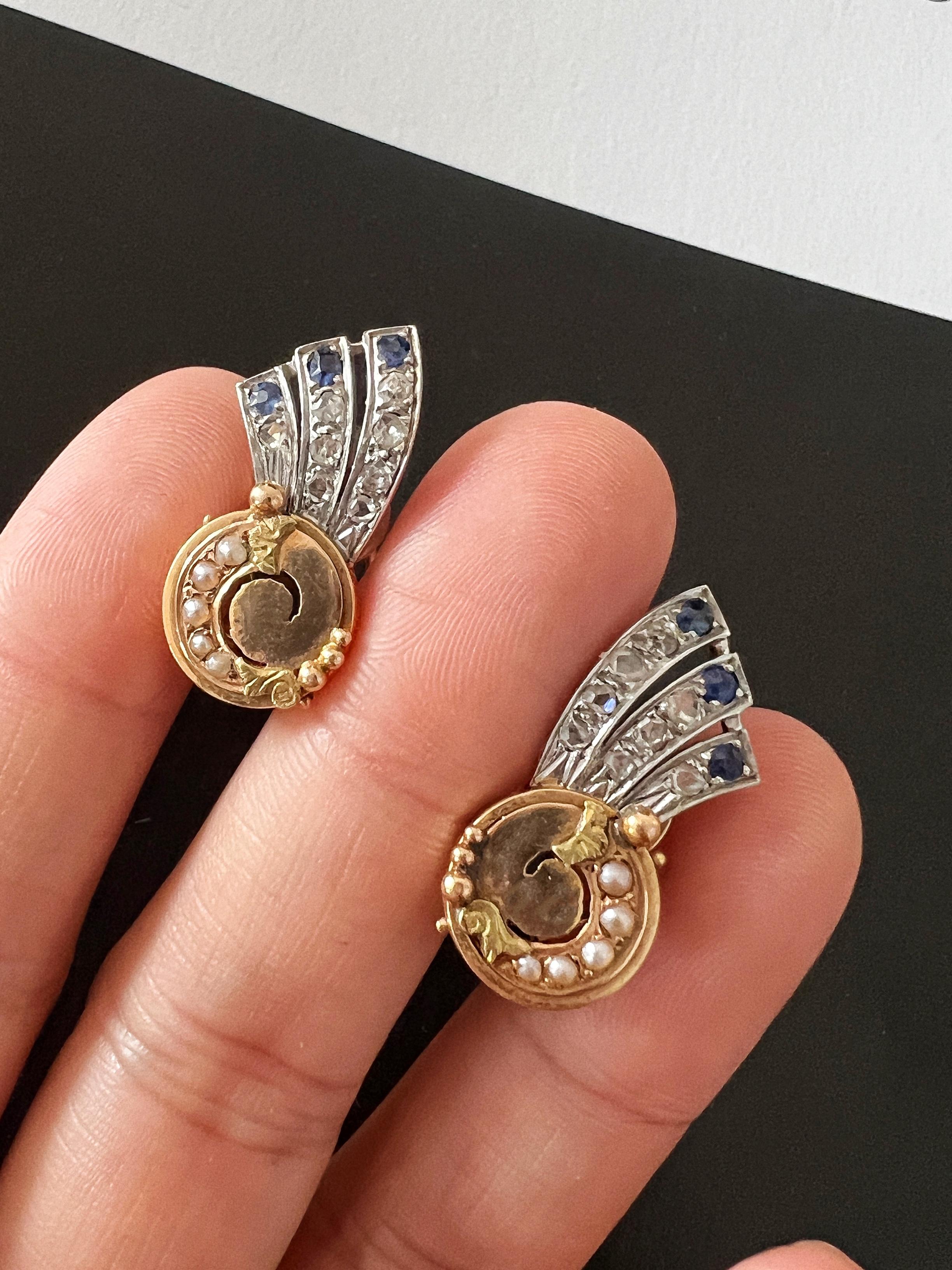 For sale a romantic pair of Art Deco-era earrings featuring shooting stars, crafted with impeccable attention to details.

The earrings are crafted in 18K white gold, yellow gold, and green gold, creating a beautiful contrast that catches the eye.