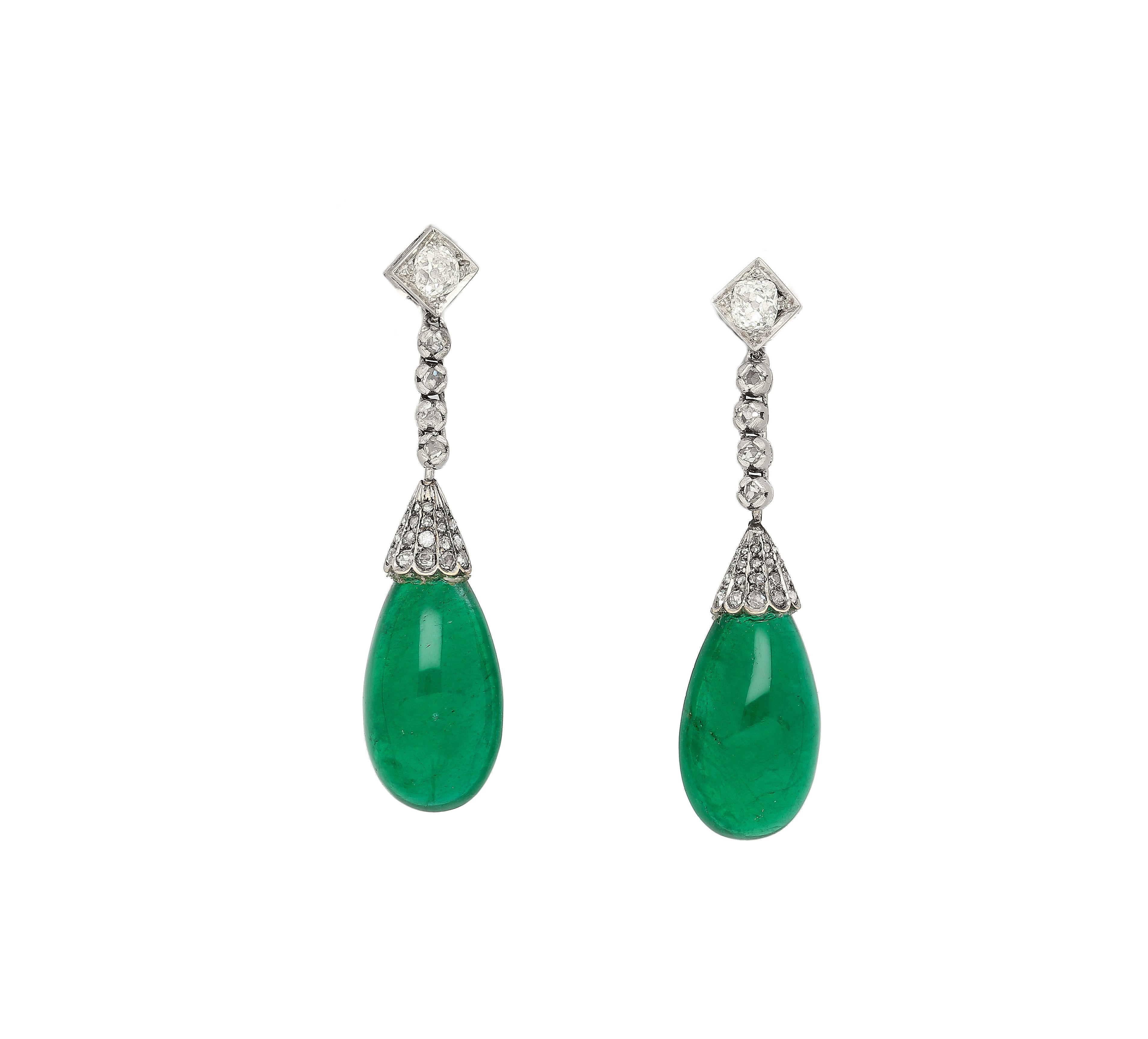 Vintage Art Deco Zambian Emerald and diamond drop earrings in 18k white gold. These earrings are 100% vintage, with all parts and pieces of original Art Deco circa 1940. 

The Emeralds are extremely vibrant, transparent, and full of life. A near