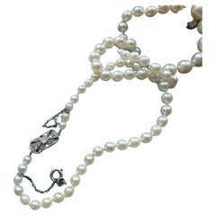 Art Deco era Akoya pearl necklace with 18K gold diamond clasp