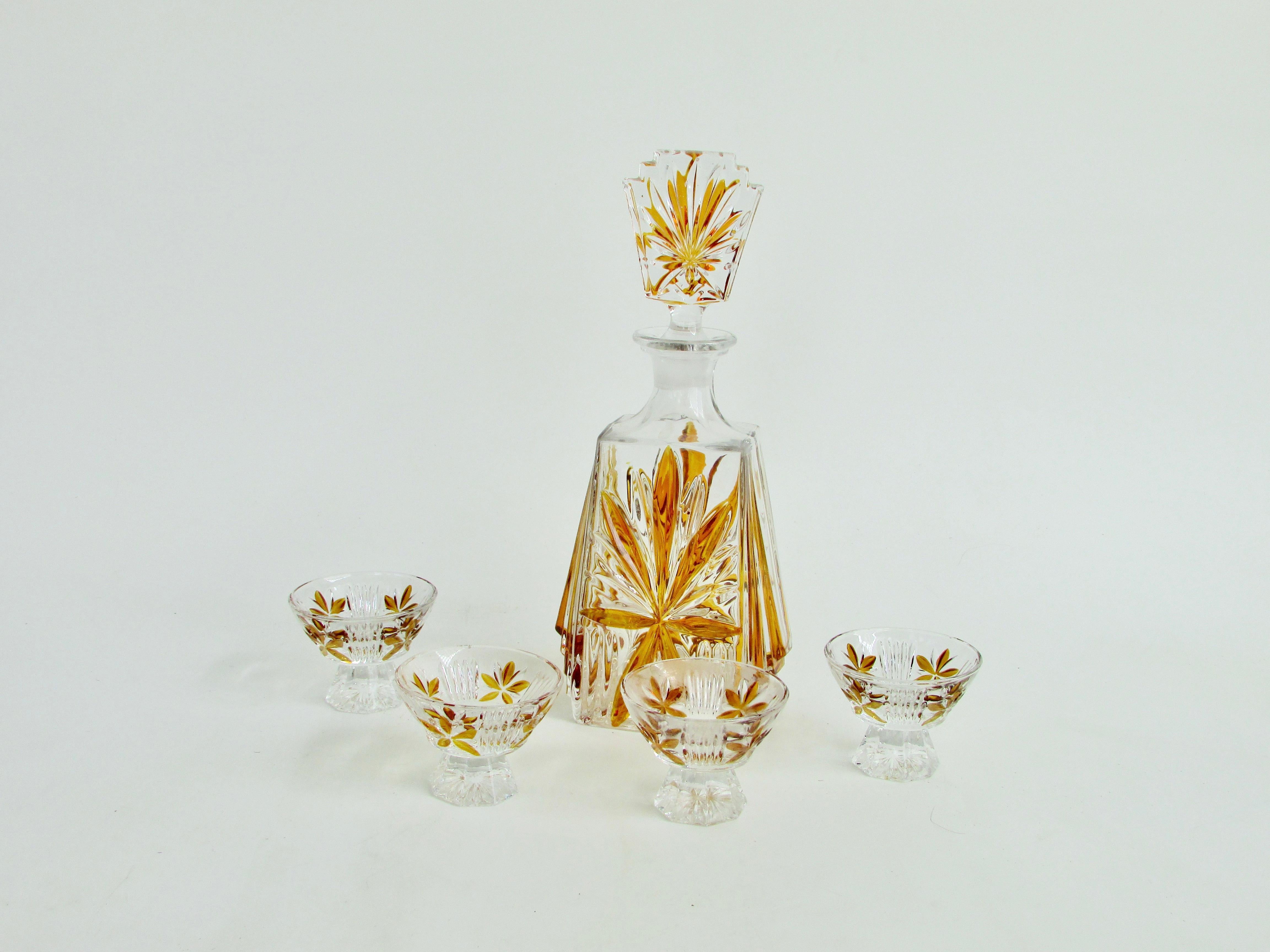 Art Deco era whiskey or aperitif stoppered decanter set . Includes four matching coupe style glasses  2.5