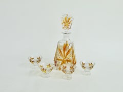 Art Deco era amber design on clear glass decanter with stopper and four cups