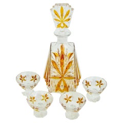 Vintage Art Deco era amber design on clear glass decanter with stopper and four cups