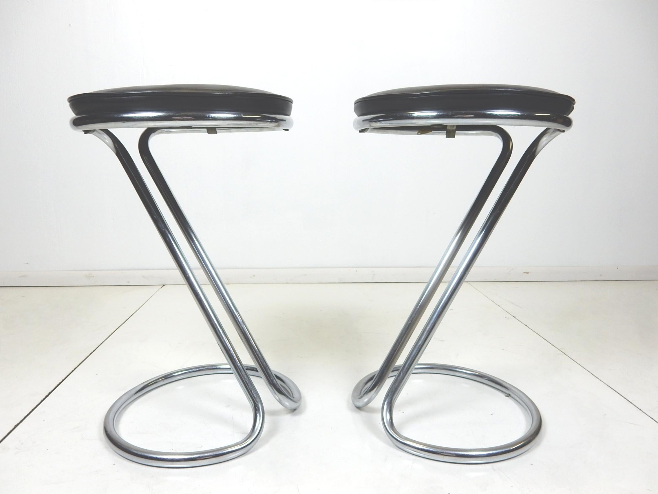 A pair of iconic Z bar stools designed by Gilbert Rohde for Troy Sunshade, circa 1940.
Both are labelled Troy Sunshade CO. on the underside.
Newly reupholstered cushion. Solid and stable stools.
This listing/price is for two stools.