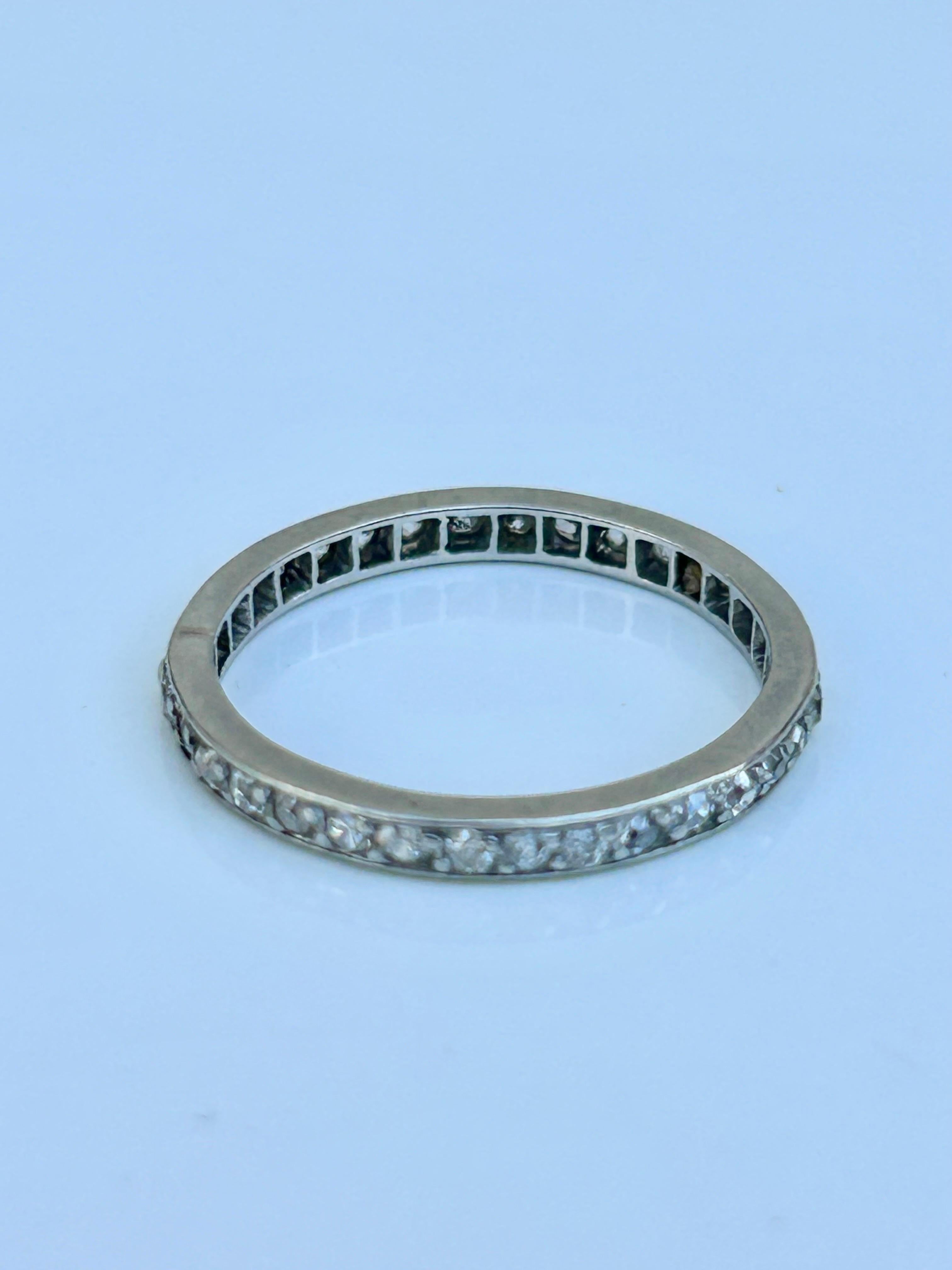Art Deco Era Platinum Diamond Full Eternity Band Ring 

Classic and timeless diamond eternity 

The item comes without the box in the photo but will be presented in a Howard’s Antique gift book

Measurements: weight 2.25g, size UK L US 6, band width
