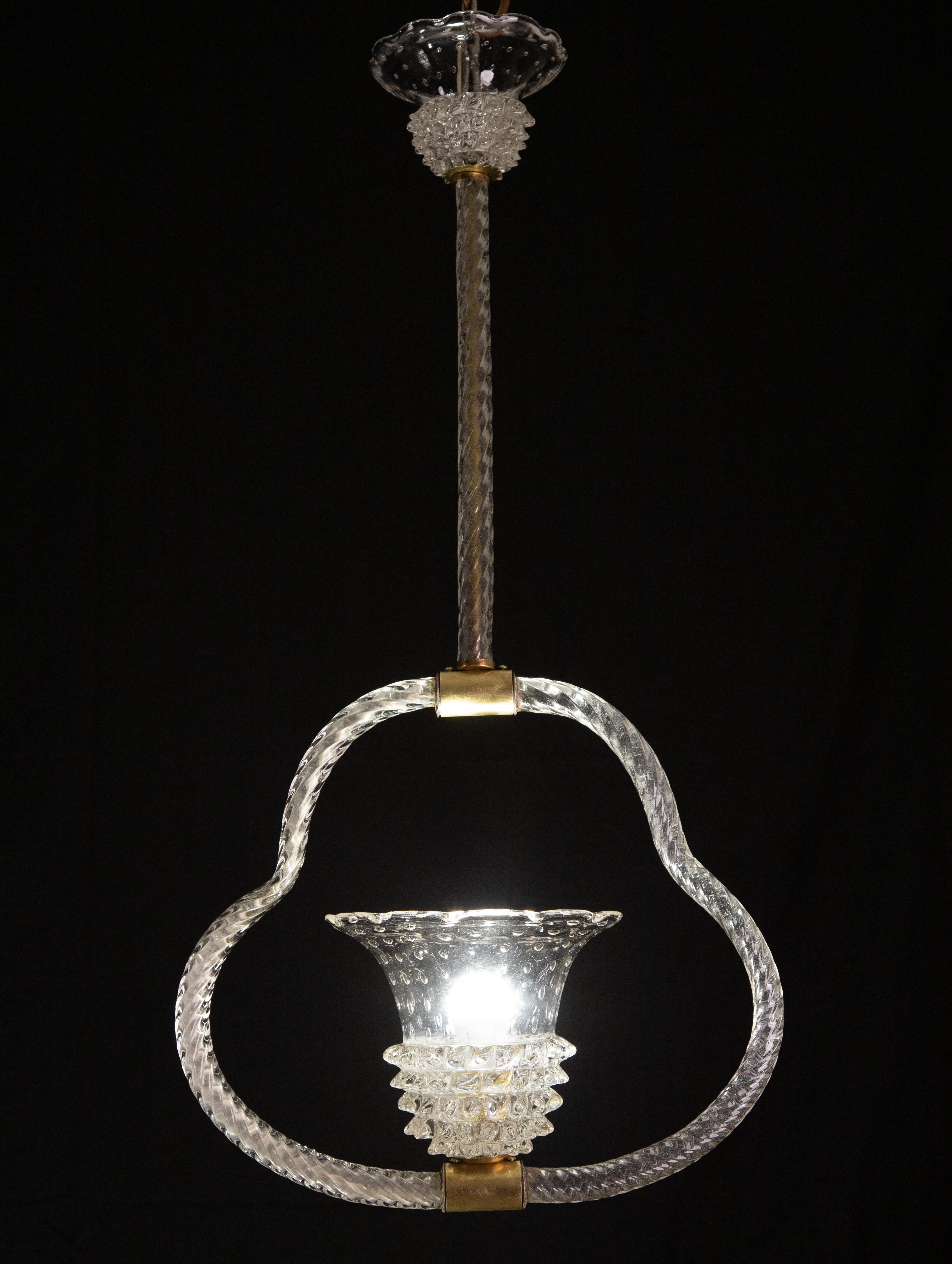 Murano Glass Chandelier from Barovier e Toso.

Period: 1940s

Very Rare for the Rostrato and Bullicante glass of the central cup, a unique piece of design.

Height 90 cm, diameter 45 centimetres.