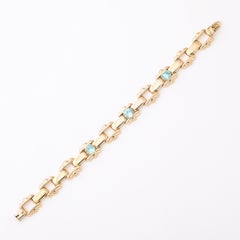 Bracelet Art déco Esemco à maillons articulés en or 14 carats, serti d'aigues-marines taille ronde