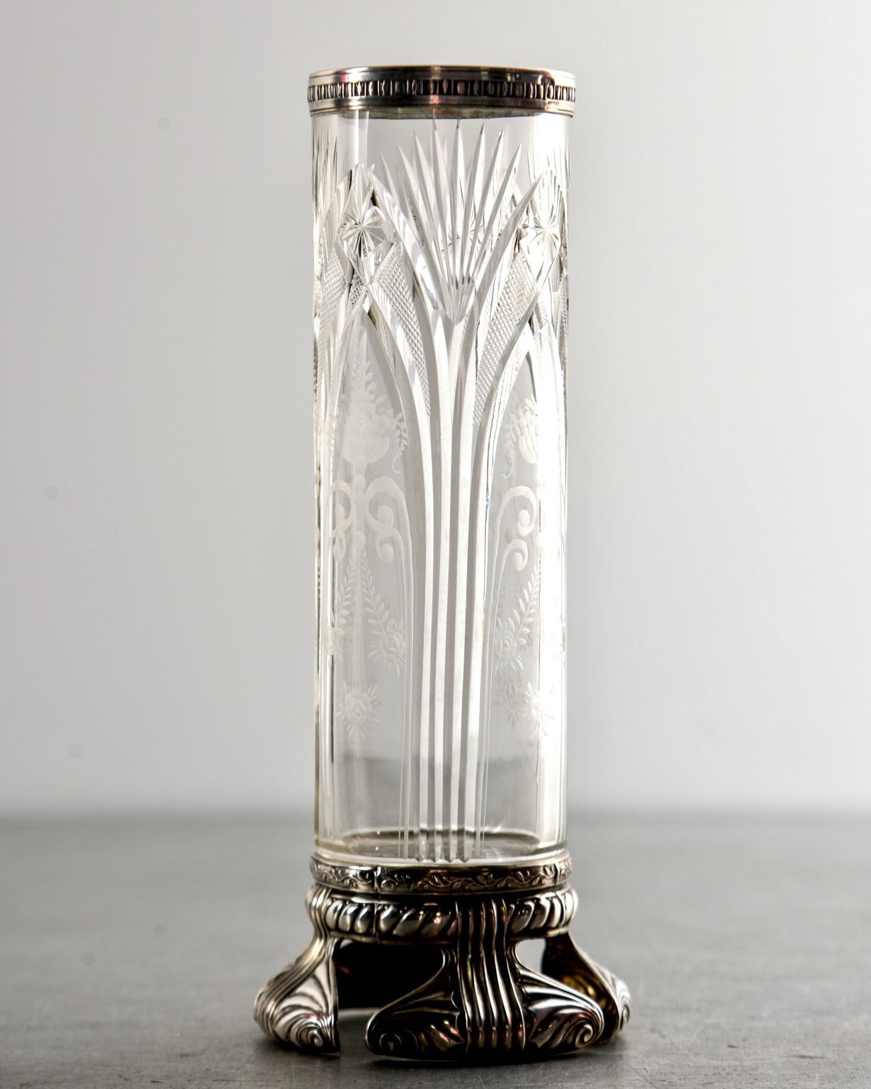 Art Deco era crystal and sterling vase features a cut design of tall, fanning sprays with etched foliate and floral detail, circa 1930s. Sterling silver rim and decorative, open work base. Marked as shown in detail photo. Unknown maker.

